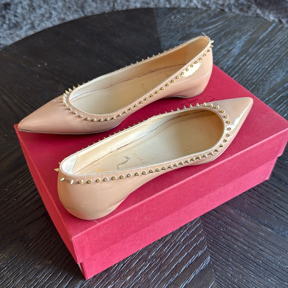 Louboutin Flats with spikes